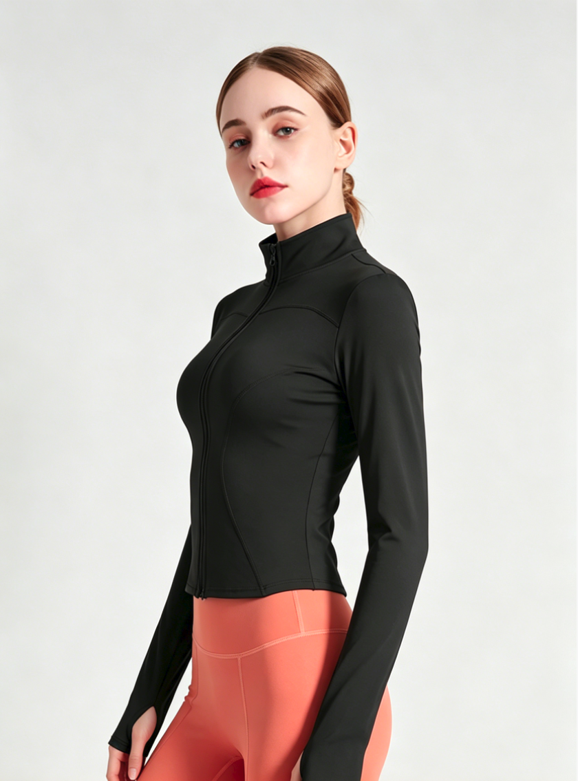 Haideyu custom women black cropped athletic zip jacket side profile, slim contour stitching, thumb hole long sleeve stand collar workout top match orange leggings
