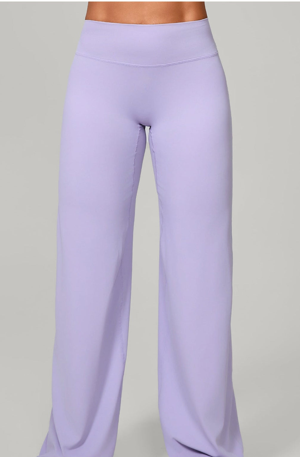 Lilac stretch flared workout trousers full-length street outfit view, bulk wholesale blank activewear