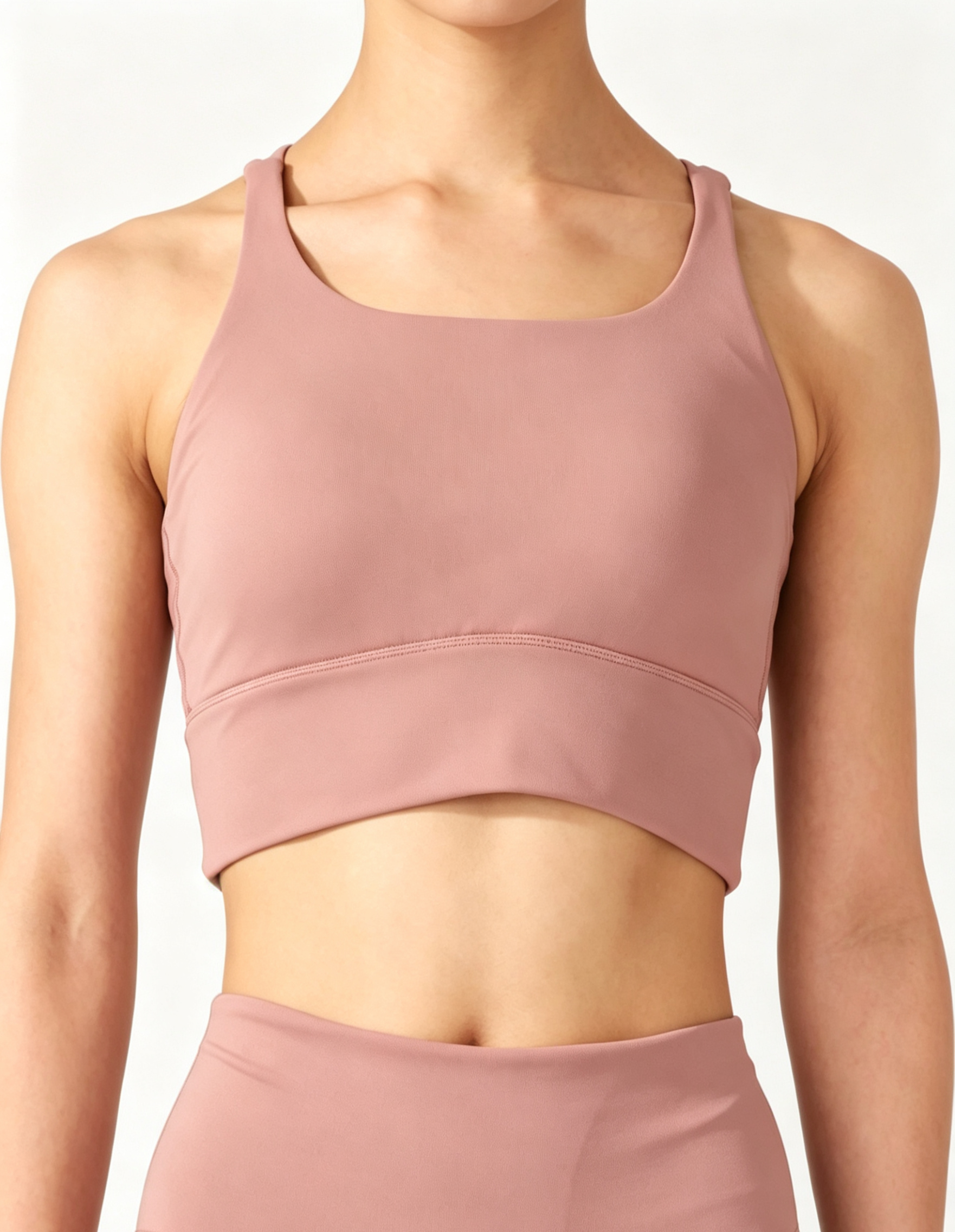 Women seamless cropped yoga bustier dusty pink front fit model shot, custom activewear from Haideyu factory