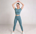 hdfish women's teal yoga set, featuring a ruched short-sleeve crop top and high-waist leggings